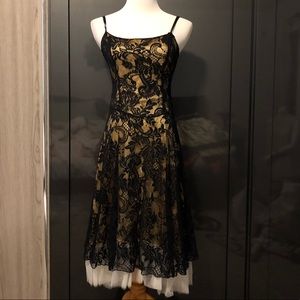 Black lace and gold tulle ruffle cocktail dress